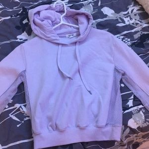 Hoodie with designs along the underarm and waist